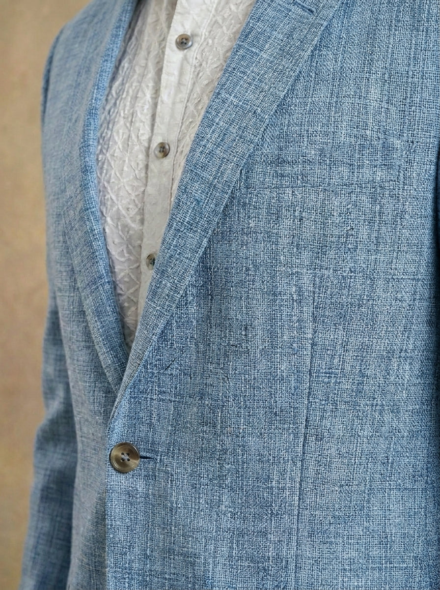 Light blue knitted blazer fabric detail