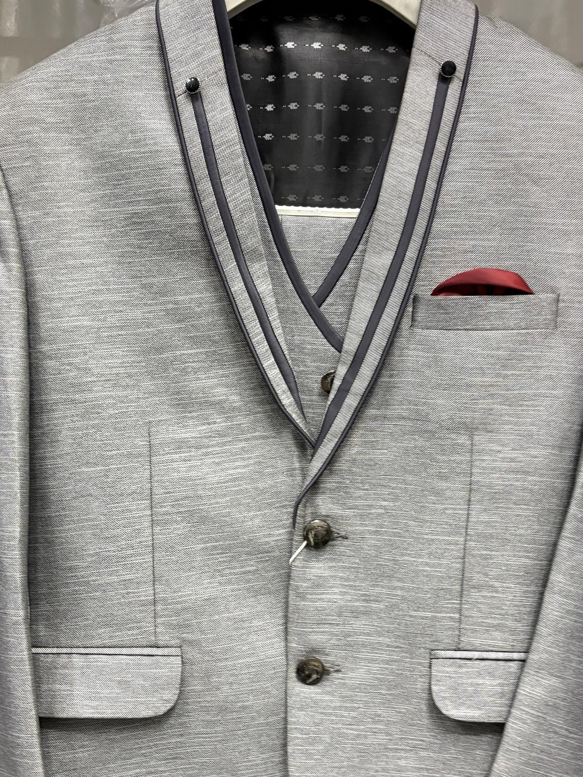 Men's grey three-piece suit