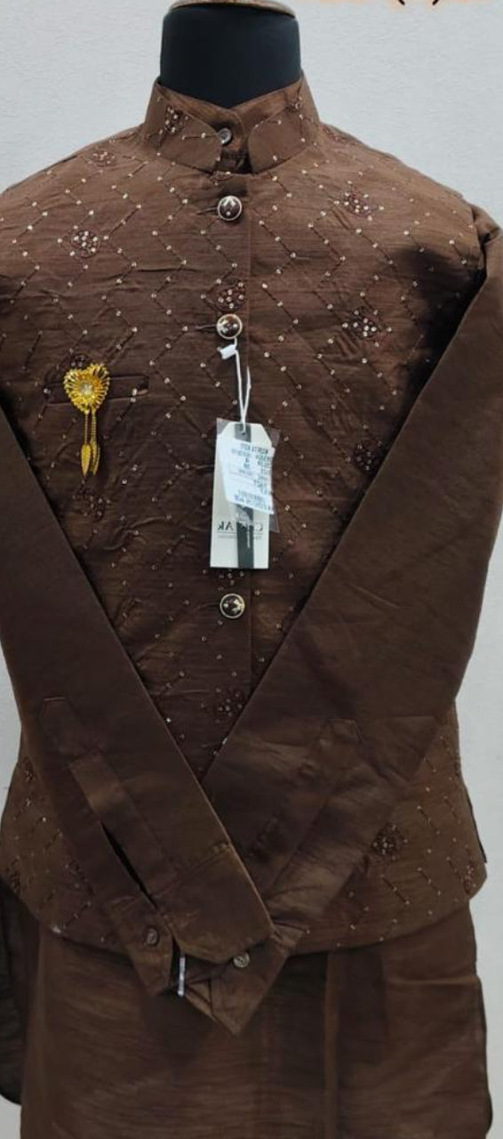 A brown embroidered men's traditional outfit displayed on a black mannequin torso against a plain light background. The set includes a jacket with a high collar and decorative embroidery, matching trousers, and a white hangtag attached.