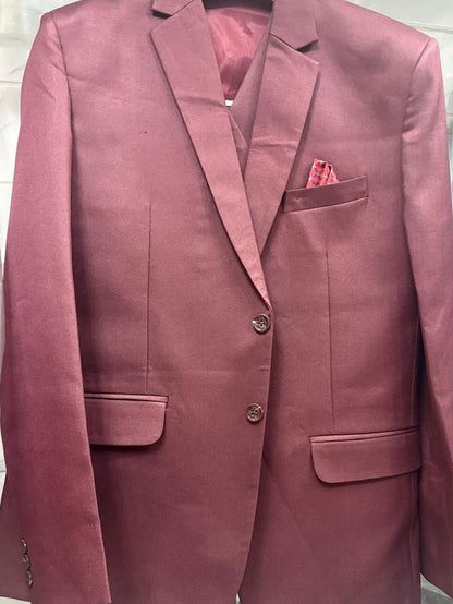 A dusty rose or mauve-colored men's blazer jacket with notch lapels, two front buttons, flap pockets, and a matching pocket square, displayed on a hanger.